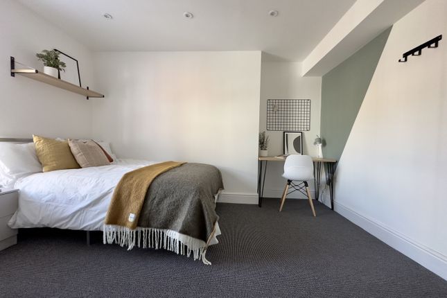 A Bright And Spacious Double Bedroom Featuring Mod...