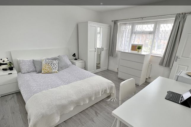 Bright And Spacious Master Bedroom Featuring A Com...
