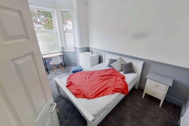 A Clean And Simple Single Toilet Room With White W...