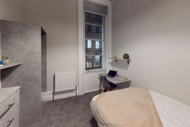 A Modern And Inviting Double Bedroom With Ample Na...