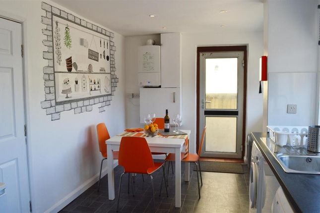 Bright And Modern Kitchen Featuring A Dining Area ...