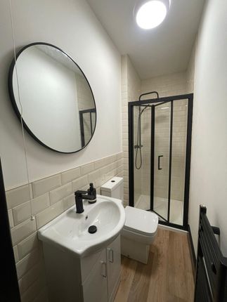 Modern And Clean Bathroom Featuring A Stylish Sink...