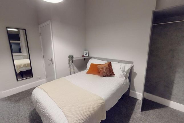 A Bright And Inviting Double Bedroom Featuring Mod...