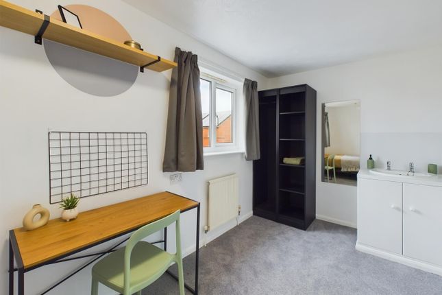 A Bright And Inviting Double Bedroom Featuring A S...