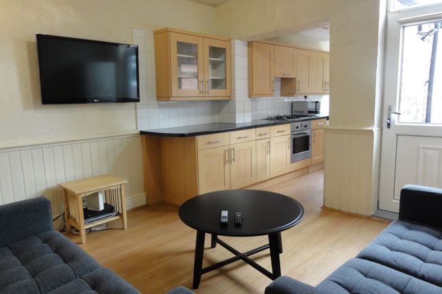 Bright Open-Plan Living Area With Two Comfortable ...