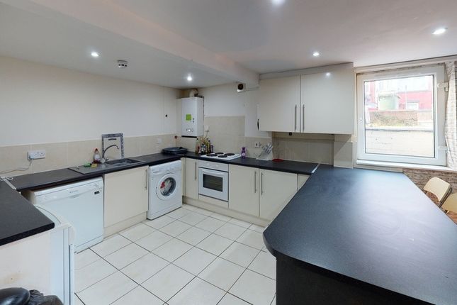 Bright, Modern Kitchen With White Cabinets, Integr...