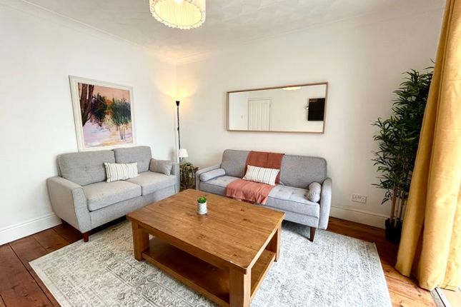 A Bright And Inviting Large Modern Living Room, Pe...