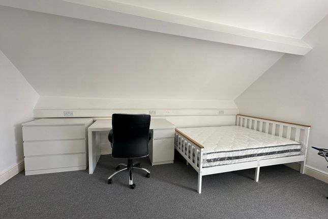 Bright And Tidy Double Bedroom Featuring A White B...
