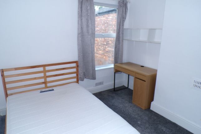 A Bright And Tidy Double Bedroom Featuring A Comfo...