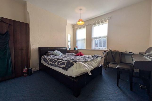 A Bright And Welcoming Living Room With Natural li...