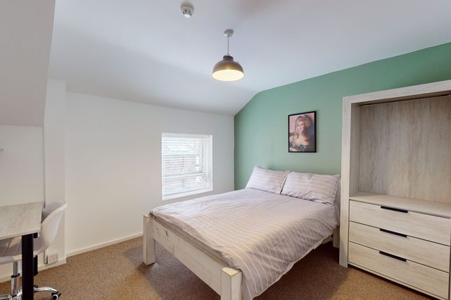 A Bright And Inviting Double Bedroom With A Modern...