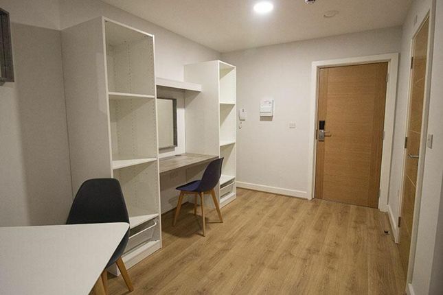 This Inviting Communal Workspace Offers A Bright A...