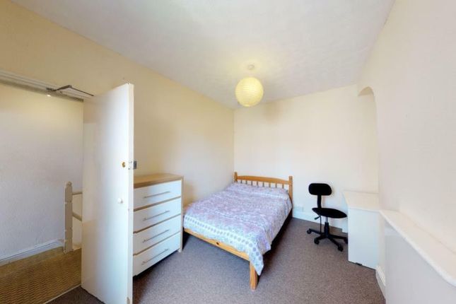 A Bright And Tidy Double Bedroom Featuring A Comfo...