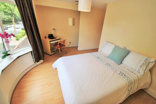A Bright And Inviting Double Bedroom Featuring A c...