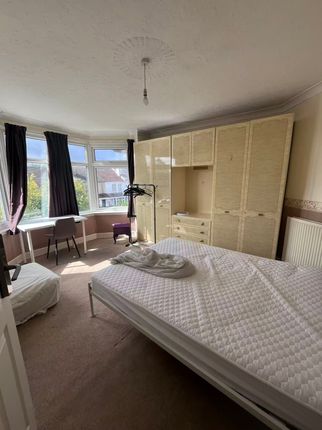 Spacious Master Bedroom Featuring A Large Bed, Amp...