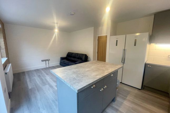 This Inviting Living Area Features Ample Space For...