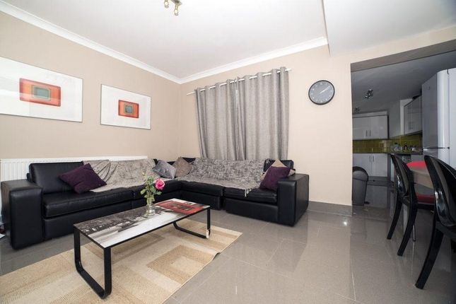 Bright, Modern Living Room With A Comfortable Blac...