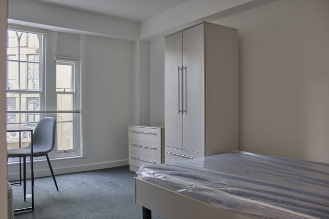 A Bright And Spacious Double Bedroom Featuring Mod...