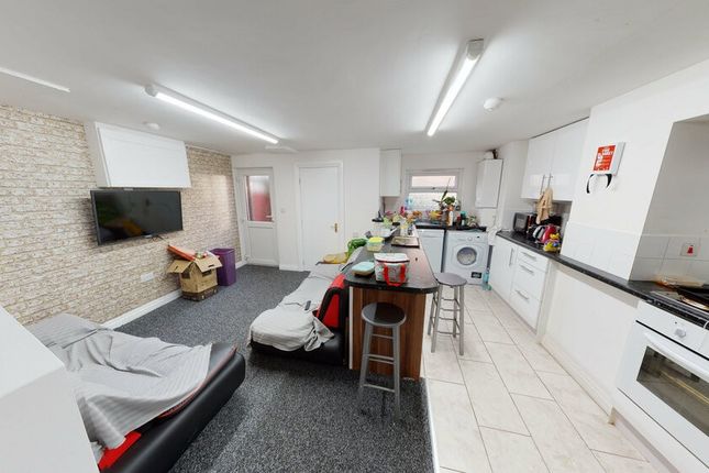 Open-Plan Living Area With A Modern Fitted Kitchen...