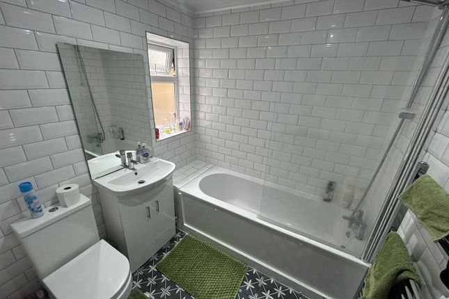 Bright And Modern Bathroom Suite Featuring A White...