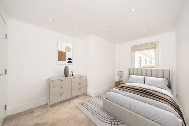Flat 15, Calico House, Clove Hitch Quay, London photo 4