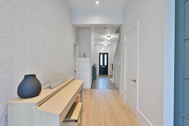 Terraced house to rent in Southdean Gardens, Southfields, London