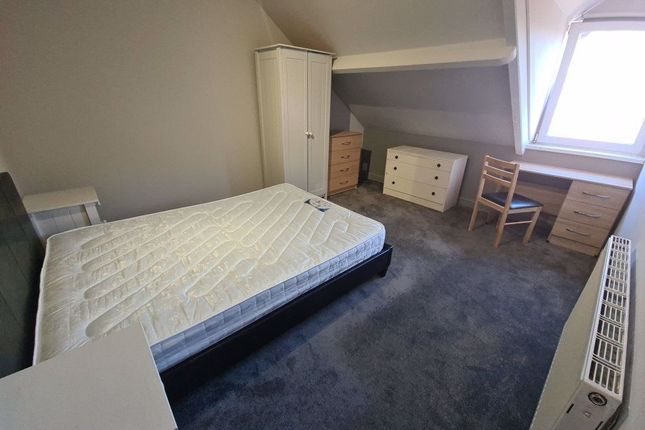 A Bright And Airy Master Bedroom Featuring A Large...