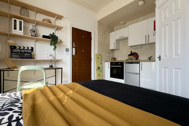 A Bright And Spacious Modern Living Room With Styl...