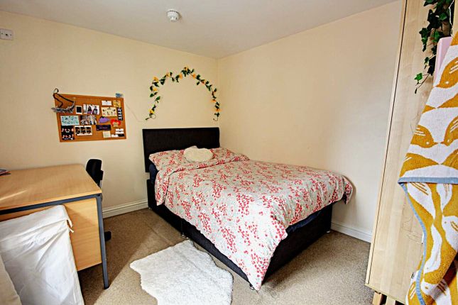 A Cozy And Inviting Double Bedroom, Perfect For A ...