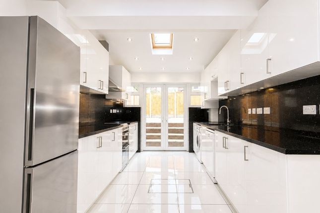 2, Woodcote Avenue, London photo 3