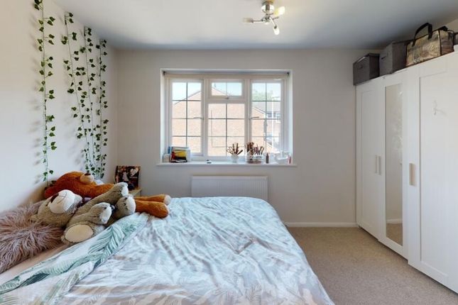A Cozy Double Bedroom Bathed In Natural Light From...