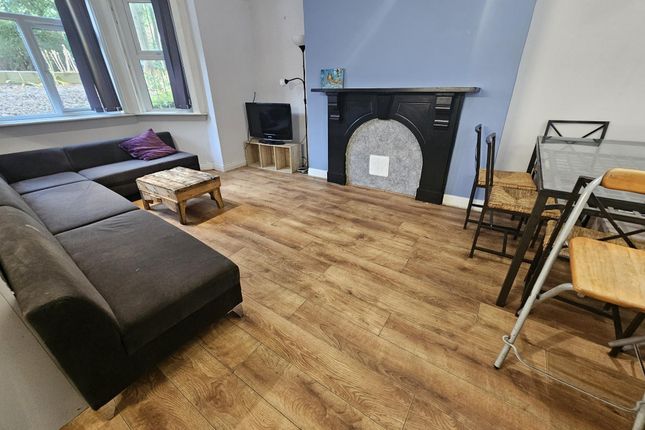 A Spacious And Well-Maintained Living Room Featuri...