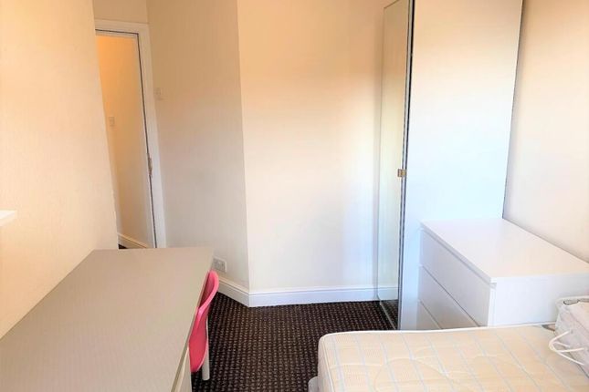 A Bright And Inviting Double Bedroom Featuring A c...