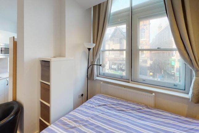 Bright And Cozy Double Bedroom Featuring A Large W...