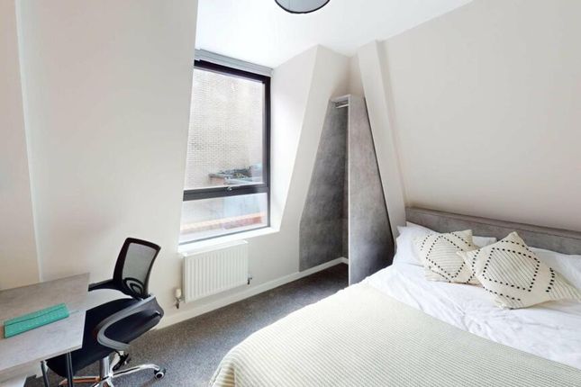 A Bright And Stylish Double Bedroom Featuring A Co...