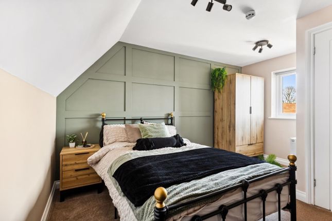 This Cozy Double Bedroom Features A Stylish Design...