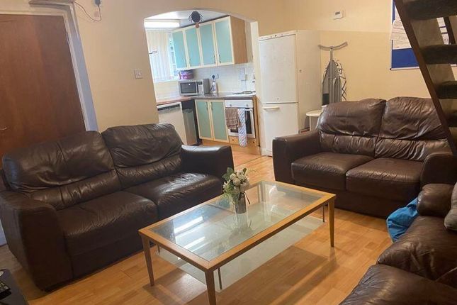 A Spacious And Well-Maintained Living Room With Mo...