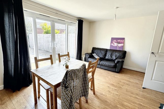 Bright And Welcoming Living Room With Ample Natura...