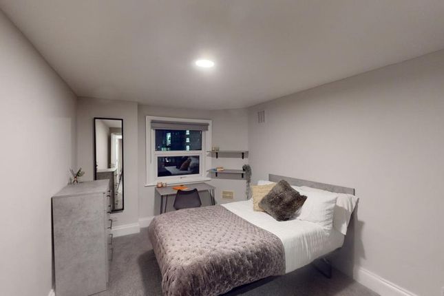 A Bright And Tidy Double Bedroom Featuring Modern ...