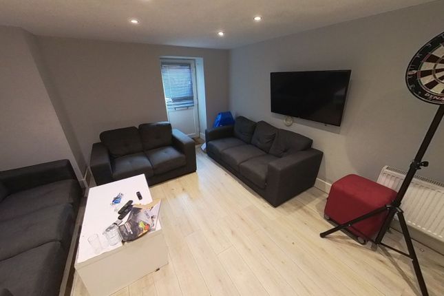 Bright And Modern Living Room Featuring Comfortabl...