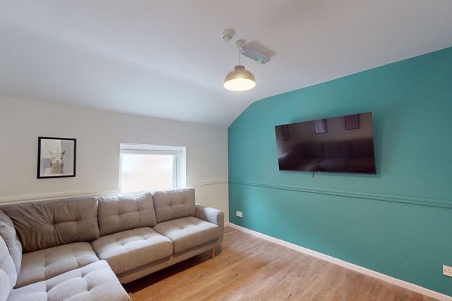 A Bright And Inviting Living Room With Modern Deco...