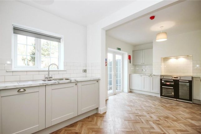A Spacious And Modern Kitchen With Plenty Of Natur...