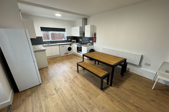 Modern Kitchen With Ample Space For Cooking And di...