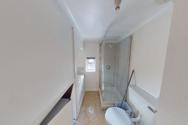A Tidy Bathroom Featuring A Modern Shower And Ampl...
