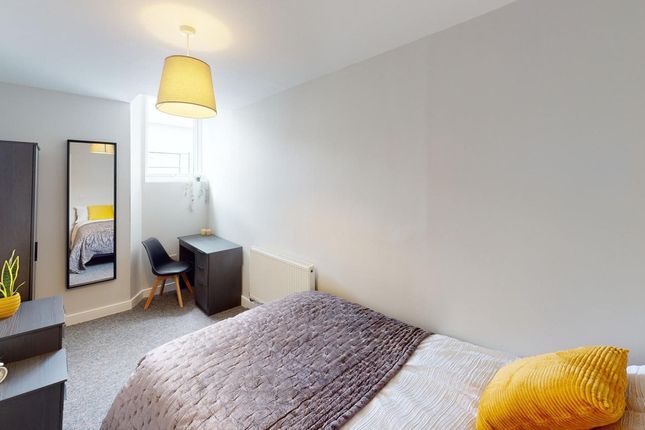 A Bright And Inviting Double Bedroom Featuring Sty...