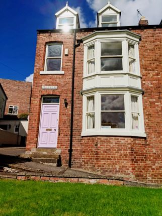 A Charming Exterior View Of A Well-Maintained Prop...