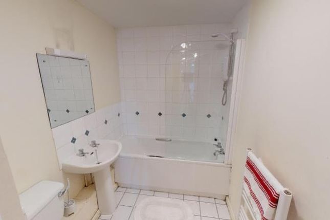 Bright And Clean Bathroom Suite Featuring A Full B...