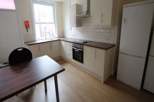 Bright And Modern Kitchen Featuring Ample Countert...