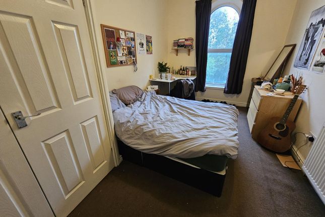 A Spacious Master Bedroom With A Comfortable Doubl...