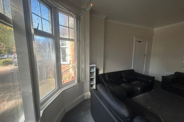 Bright And Spacious Living Room With Large Windows...